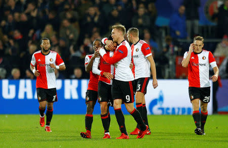 Soccer Football - Champions League - Feyenoord vs Napoli - De Kuip, Rotterdam, Netherlands - December 6, 2017 Feyenoord's Nicolai Jorgensen celebrates scoring their first goal with teammates REUTERS/Michael Kooren