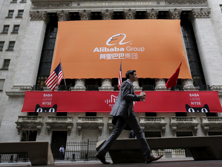 Signage for Alibaba Group Holding Ltd. covers the front facade of the New York Stock Exchange November 11, 2015.</p>
<p> REUTERS/Brendan McDermid/File Photo