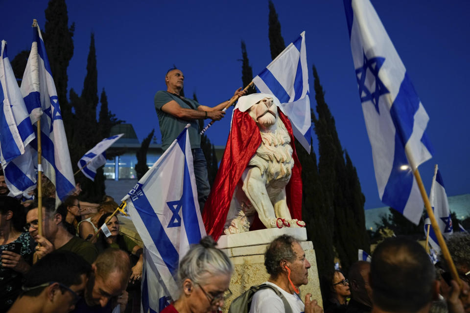 Israelis protest against plans by Prime Minister Benjamin Netanyahu's government to overhaul the judicial system and in support of the Supreme Court ahead of a pivotal appeals hearing beginning Tuesday, in Jerusalem, Monday, Sept. 11, 2023. (AP Photo/Ohad Zwigenberg)