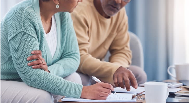 Couple going over their taxes in retirement