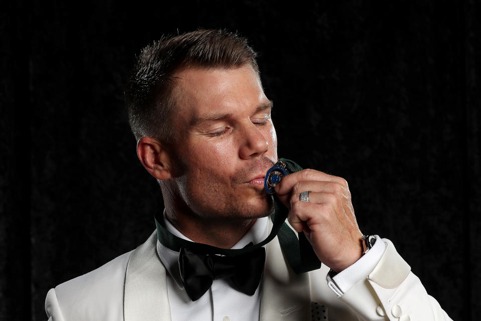 David Warner kisses the Allan Border Medal during the 2020 Cricket Australia Awards at Crown Palladium on February 10, 2020 in Melbourne, Australia.