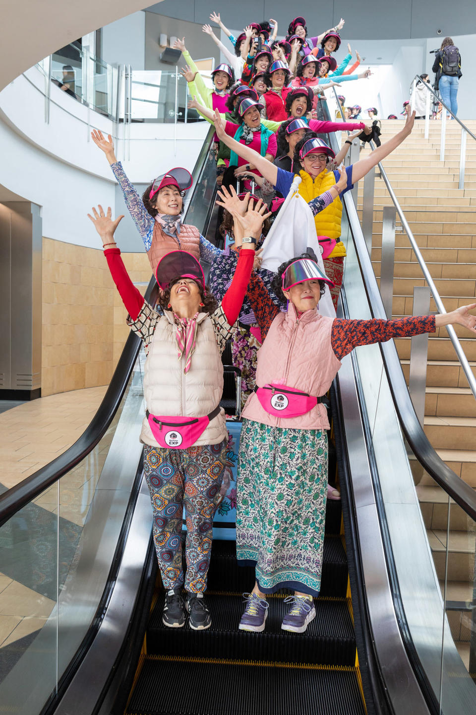 A flash mob of ajummas at San Diego International Airport on March 8. (Gavin Zau)