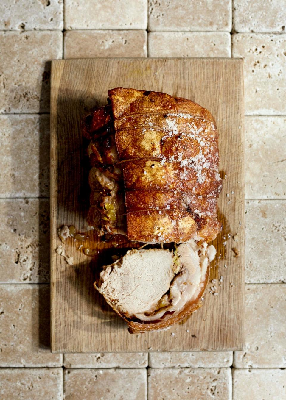 Roast pork with a rich stuffing cut through with honey vinegar (Kim Lightbody)