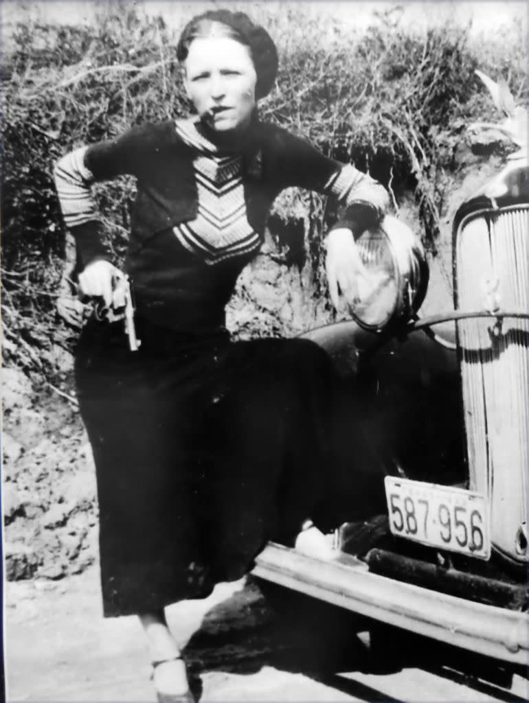 “Shooting someone to take their shit is as American as apple pie,” says Hughes. Pictured is Bonnie Elizabeth Parker, of outlaw duo Bonnie and Clyde. More than 20,000 people came to view her body as she lay in state following the pair’s bullet-riddled demise in 1934. (Credit: Universal History Archive/Universal Images Group via Getty Images)