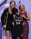 Virginia Tech's Elizabeth Kitley, left, poses for a photo with WNBA commissioner Cathy Engelbert, right, after being selected 24th overall by the Las Vegas Aces during the second round of the WNBA basketball draft on Monday, April 15, 2024, in New York. (AP Photo/Adam Hunger)