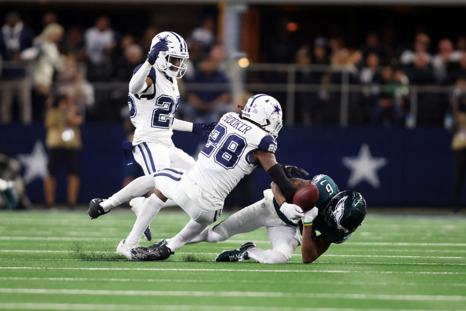 Dec 10, 2023; Arlington, Texas, USA; Philadelphia Eagles wide receiver DeVonta Smith (6) cannot catch a pass while defended by Dallas Cowboys safety Malik Hooker (28) in the second quarter at AT&T Stadium. Mandatory Credit: Tim Heitman-USA TODAY Sports