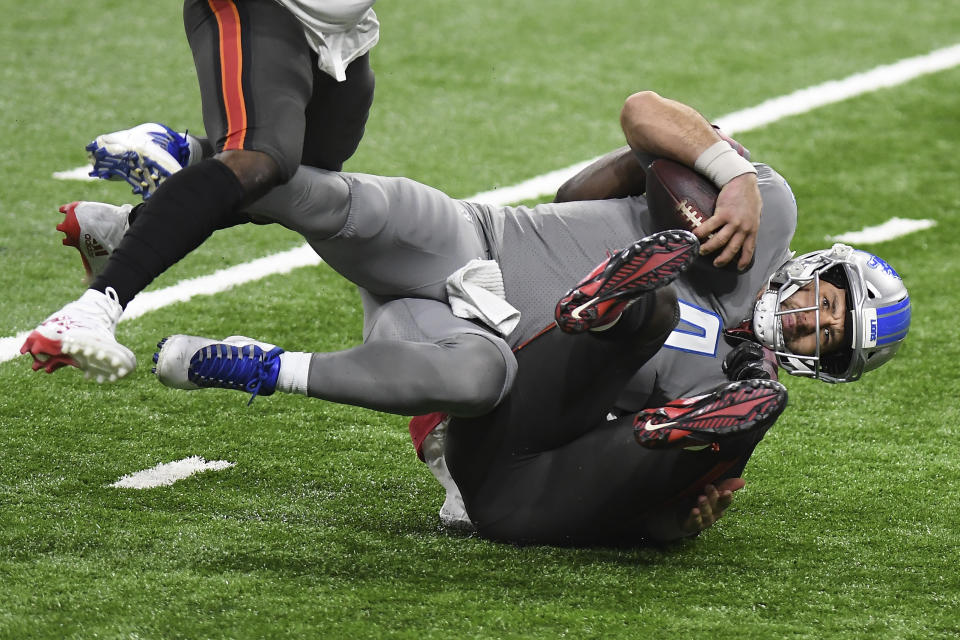 Detroit Lions quarterback Chase Daniel (4) is sacked by Tampa Bay Buccaneers inside linebacker Devin White during the first half of an NFL football game, Saturday, Dec. 26, 2020, in Detroit. (AP Photo/Lon Horwedel)