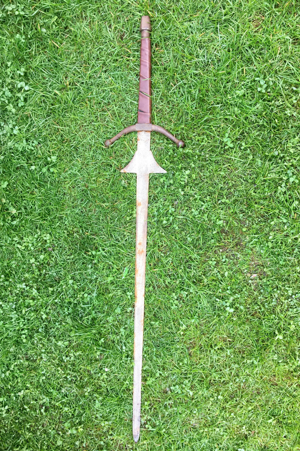 The sword discovered by Matilda Jones, from Norton, Doncaster.  A schoolgirl could become a thing of legend after pulling an historic sword from the same Cornish lake where King Arthur's Excalibur was famously thrown.  See ROSS PARRY story RPYSWORD.  Little Matilda Jones. Aged seven, came home with the perfect holiday souvenir after stumbling across the sword which is the same height as her.  She found the 4ft long metal blade while paddling in waist deep waters at Dozmary Pool on August 29.  Proud dad Paul Jones, 51, had only told Matilda and her sister Lois, four, about the legend of King Arthur moments before the discovery during a six-day holiday in Cornwall.  The 51-year-old, from Doncaster, south Yorks., predicts that the sword is probably around 30 years old and was used as an old film prop.