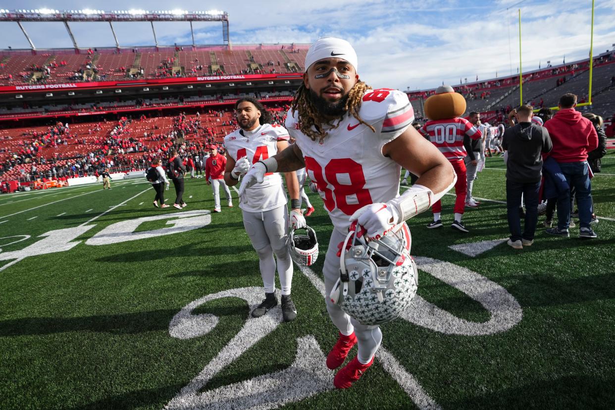 Nov 4, 2023; Piscataway, New Jersey, USA; Ohio State Buckeyes tight end Gee Scott Jr. (88) runs off the field following the NCAA football game against the Rutgers Scarlet Knights at SHI Stadium. Ohio State won 35-16.