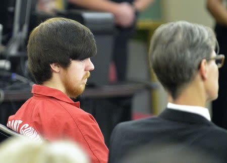 Ethan Couch (L), the so-called "affluenza" teen, is seated next to his attorney Scott Brown as he appears in his first adult court hearing in Fort Worth, Texas April 13, 2016. REUTERS/Fort Worth Star-Telegram/Max Faulkner/Pool