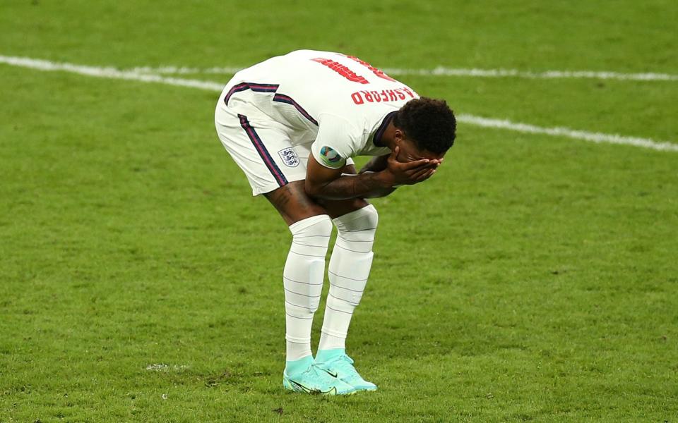 Rashford reacts after hitting the post in their team's third penalty in a penalty shoot-out during the UEFA Euro 2020 Championship Final between Italy and England