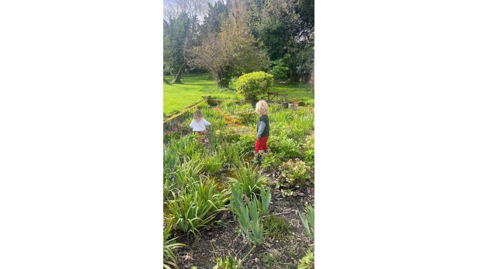 A photo of Romy and Wilfred in their family garden