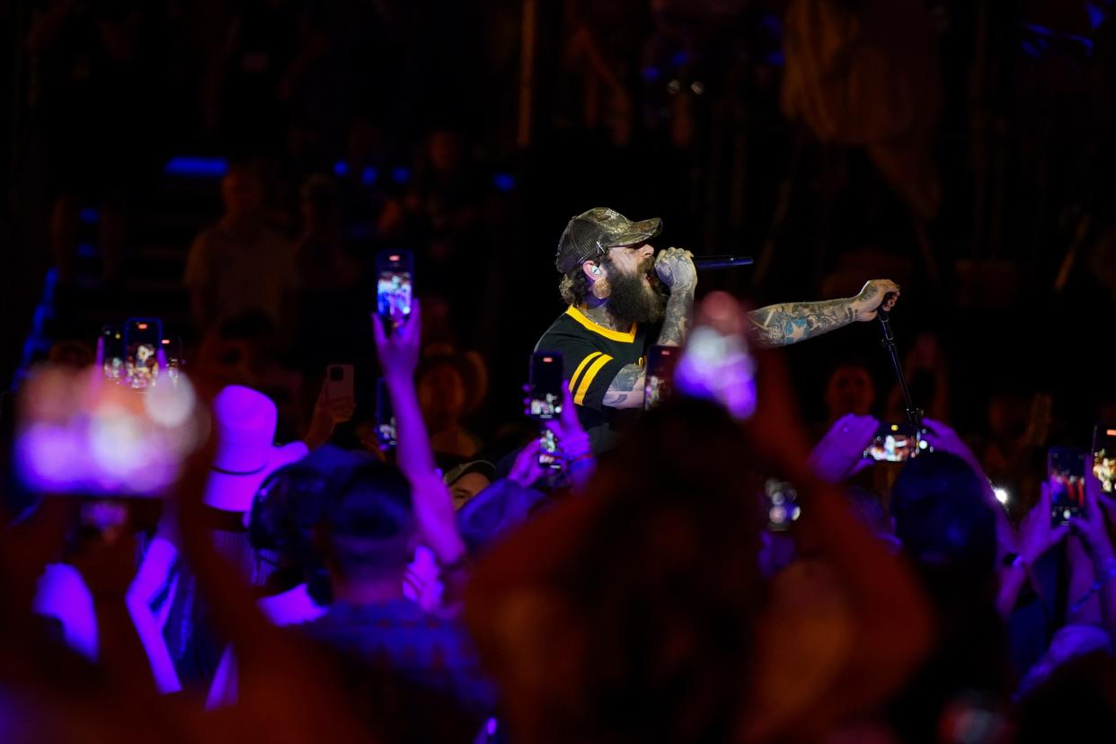 Post Malone performs during CMA Fest at Nissan Stadium in Nashville, Tenn., Thursday, June 6, 2024.