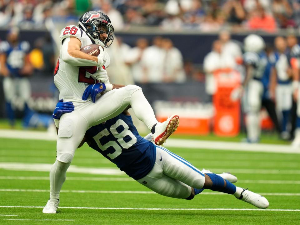 Rex Burkhead makes a catch against the Indianapolis Colts.