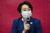 Tokyo 2020 President Seiko Hashimoto speaks during the news conference after receiving a report from a group of infectious disease experts on Friday, June 18, 2021, in Tokyo. The experts including Shigeru Omi, head of a government coronavirus advisory panel, issued a report listing the risks of allowing the spectators and the measurements to prevent the event from triggering a coronavirus spread. (Yuichi Yamazaki/Pool Photo via AP)