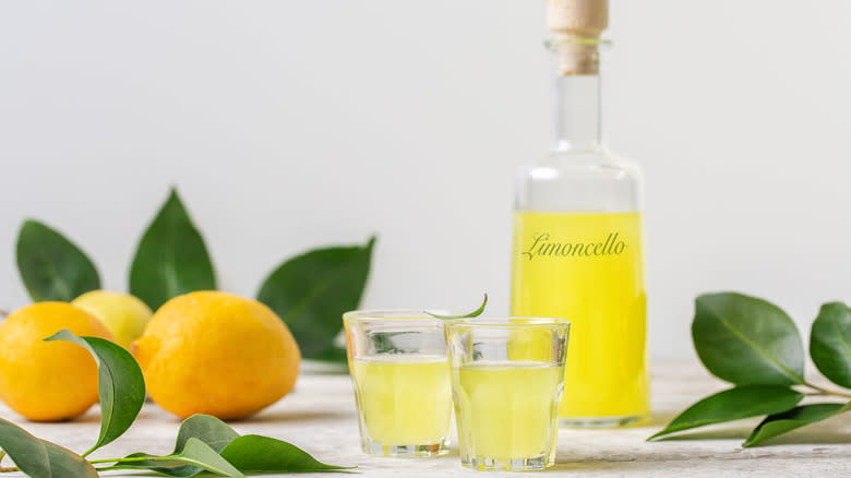 Limoncello liqueur and liemons