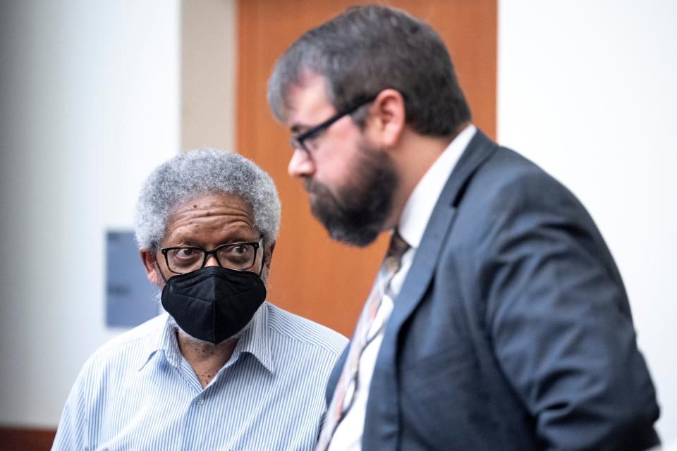 Robert Thomas, 74, left, speaks with one of his defense attorneys, Donald Regensburger, on Thursday, Nov. 17, 2022 in Franklin County Common Pleas Court. Thomas was on trial for involuntary manslaughter and aggravated menacing in the 2021 shooting death of his neighbor, 43-year-old Jason Keys, even though a neighbor is accused of actually shooting Keys. A jury on Friday found Thomas not guilty of involuntary manslaughter, but convicted him of aggravated menacing for coming up to Keys with a rifle and rounds of ammo.