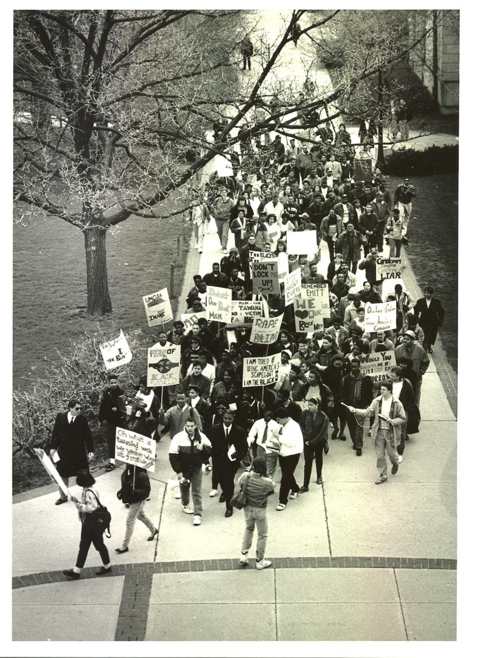 1990 - Black and white file photo. Black students at OSU - Ohio State University - march on the Oval to protest false accusations against blacks. Dated April 12, 1990. Used April 13, 1990. For Doulin story.

Protest movements. Dispatch Photo by Chris Russell.