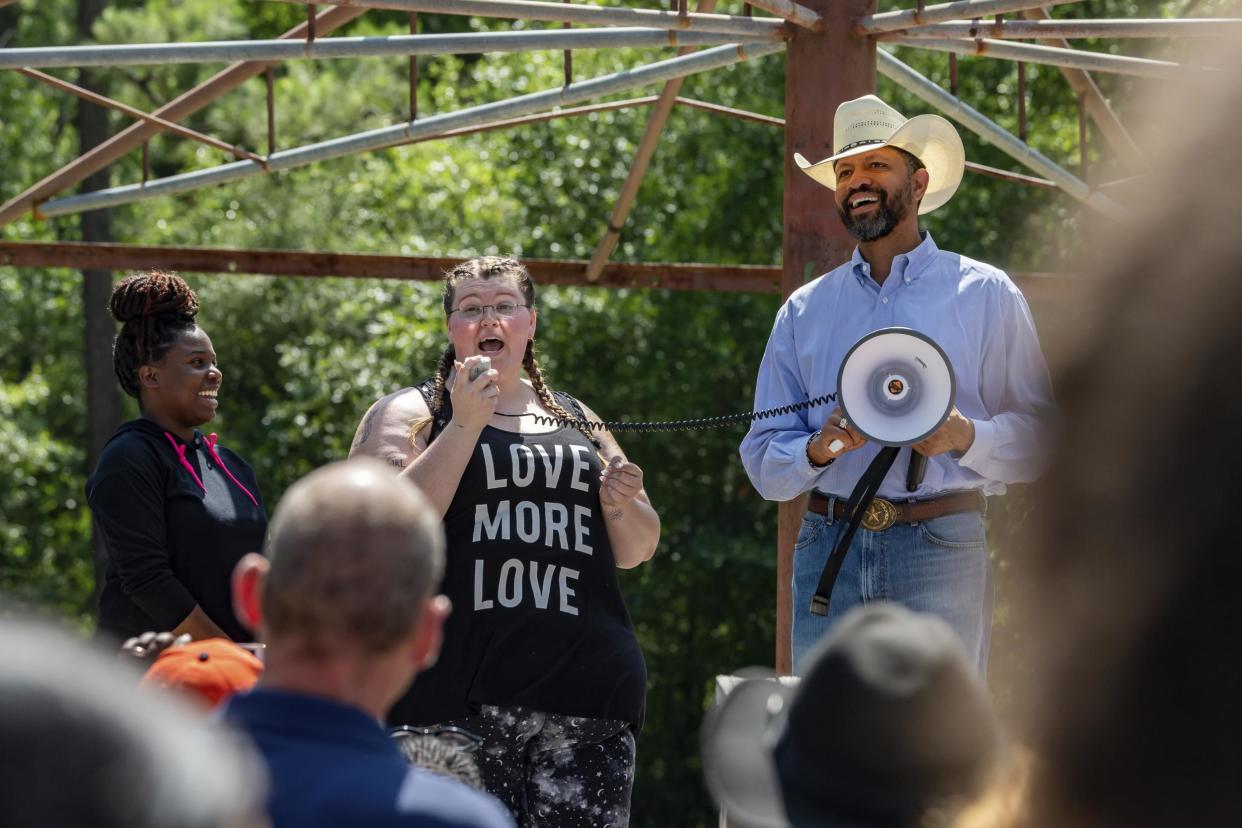 At a peace march in support of Black Lives Matter in Vidor, Texas, organisers Yalakesen Baaheth and Madison Malone are joined on stage by Rev. Michael Cooper of the local NAACP: Fran Ruchalski/The Beaumont Enterprise via AP