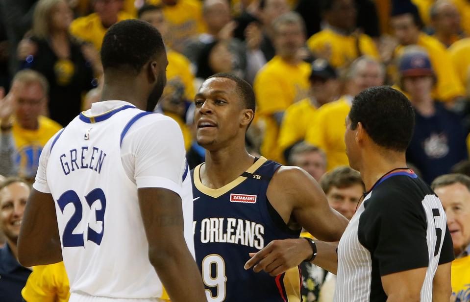 Draymond Green and Rajon Rondo have been getting at it during the Conference Semifinals. (AP Photo)