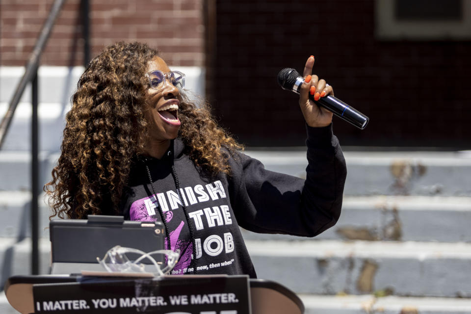 Jessica Fortune Barker, cofounder of Lift Our Vote, talks about voting rights during the John Lewis Advancement Act Day of Action, a voter education and engagement event Saturday, May 8, 2021, in front of Brown Chapel A.M.E. Church in Selma, Ala. (AP Photo/Vasha Hunt)