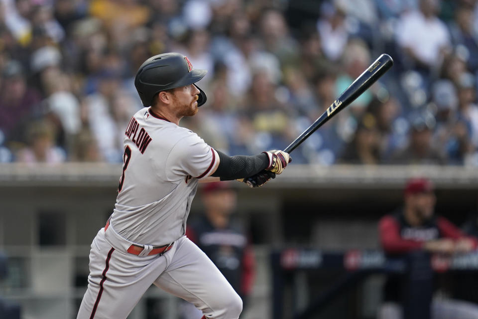 Arizona Diamondbacks' Jordan Luplow watches his two-run, in the park home run hit during the third inning of a baseball game against the San Diego Padres, Tuesday, June 21, 2022, in San Diego. (AP Photo/Gregory Bull)