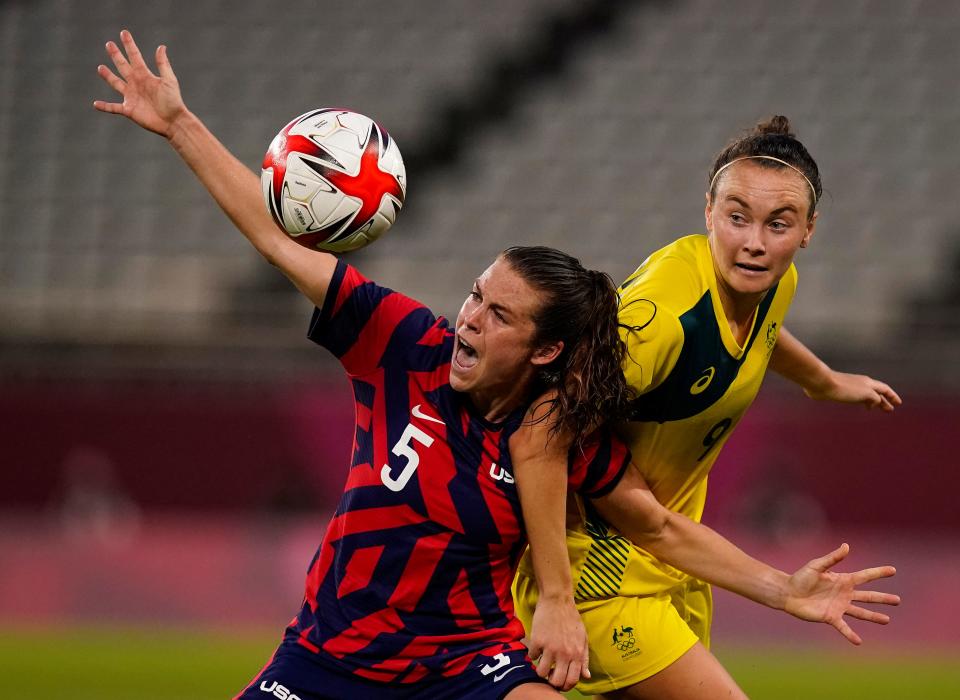 Team United States defender Kelley O'Hara (5) and Team Australia forward Caitlin Foord (9) battle for the ball in the second half during the bronze medal match Thursday, Aug 5, 2021 during the Tokyo 2020 Olympic Summer Games at Ibaraki Kashima Stadium, Ibaraki, Japan.