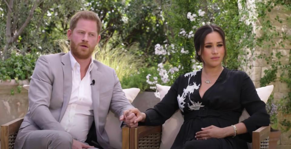 The Duke and Duchess of Sussex pictured in a still from their interview with Oprah Winfrey. (Photo: CBS)