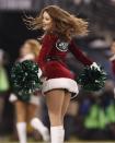 <p>A New York Jets cheerleader performs during a timeout during the second quarter of an NFL football game against the Miami Dolphins, Saturday, Dec. 17, 2016, in East Rutherford, N.J. (AP Photo/Adam Hunger) </p>