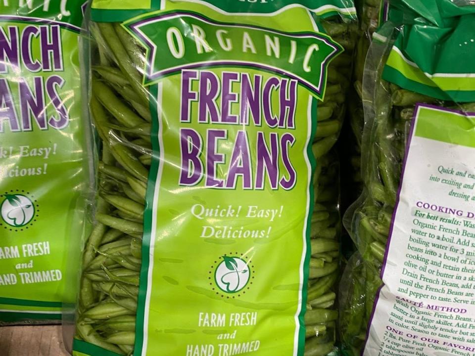 display case of costco bulk organic french beans