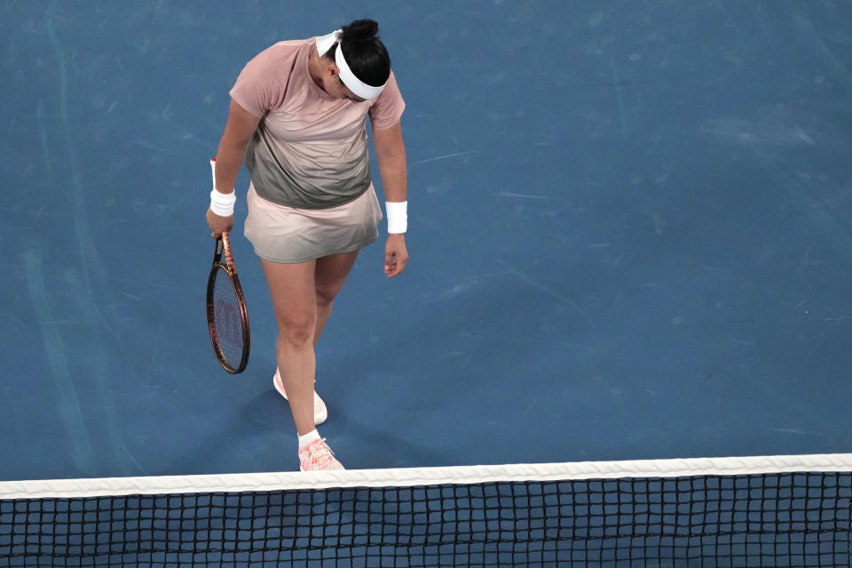 Ons Jabeur of Tunisia reacts during her second round match against Mirra Andreeva of Russia at the Australian Open tennis championships at Melbourne Park, Melbourne, Australia, Wednesday, Jan. 17, 2024. (AP Photo/Alessandra Tarantino)