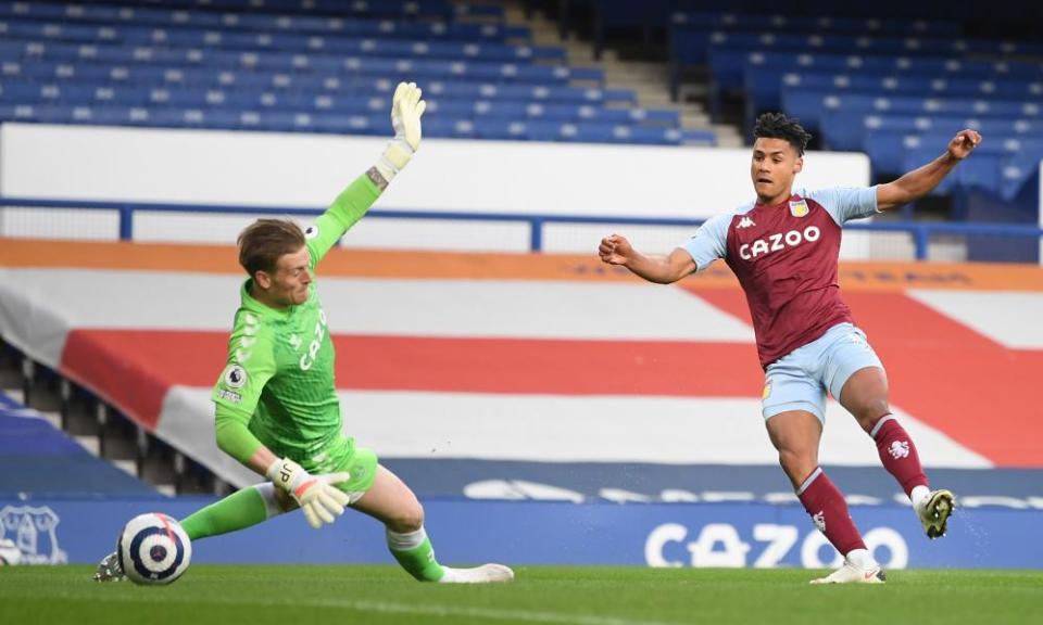 Ollie Watkins beats Jordan Pickford to open the scoring for Aston Villa.