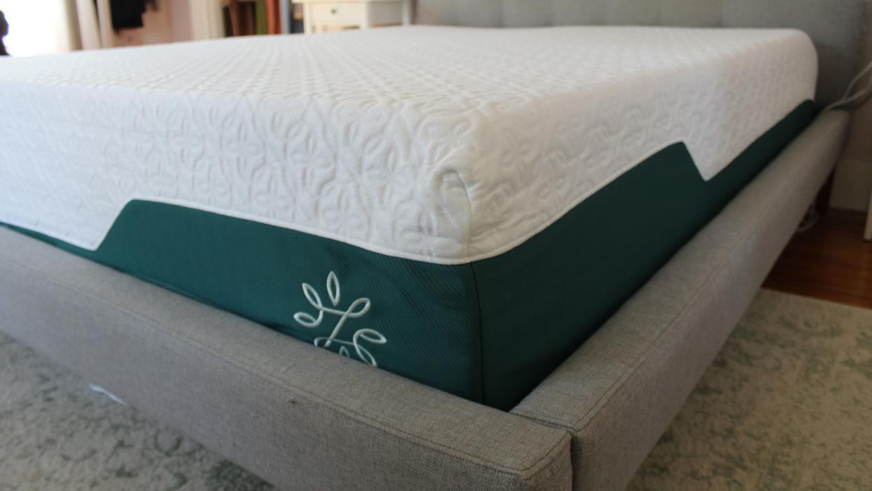  The Zinus green tea mattress on test, showing how we test mattresses . 