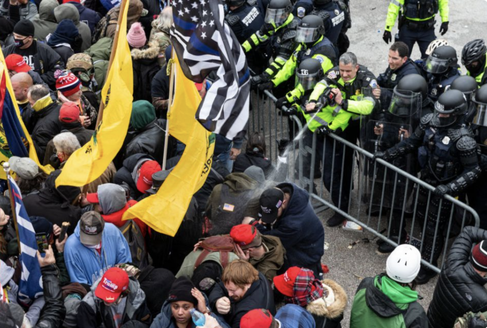 Pro-Trump protesters clash with police outside the US Capitol Building last month. Source: Getty Images 