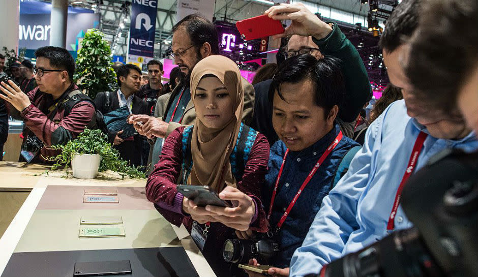 Visitors exploring Sony Xperia devices at MWC.