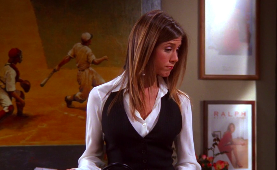 Rachel wearing a suit to work