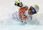 Andorra's Joan Verdu Sanchez crashes during the first run of the men's alpine skiing giant slalom event at the 2014 Sochi Winter Olympics at the Rosa Khutor Alpine Center February 19, 2014. REUTERS/Ruben Sprich (RUSSIA - Tags: SPORT SKIING OLYMPICS)