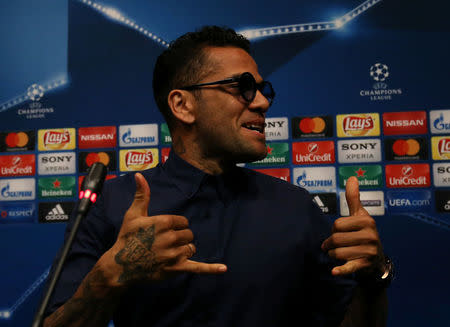 Soccer Football - Juventus news conference - UEFA Champions League Quarterfinal - Camp Nou stadium, Barcelona, Spain - 18/4/2017 - Juventus's Dani Alves attends a news conference. REUTERS/Albert Gea