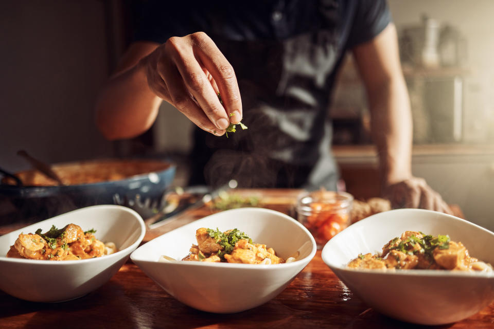 A man preparing gourmet food.