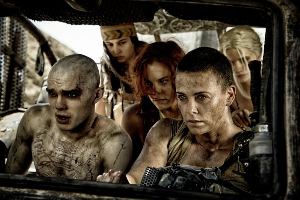 Nux (Nicholas Hoult, left), Fragile (Courtney Eaton), Capable (Riley Keough), Furiosa (Charlize Theron) and Wag (Abbey Lee Kershaw) in Furiosa's truck, known as the War Rig.