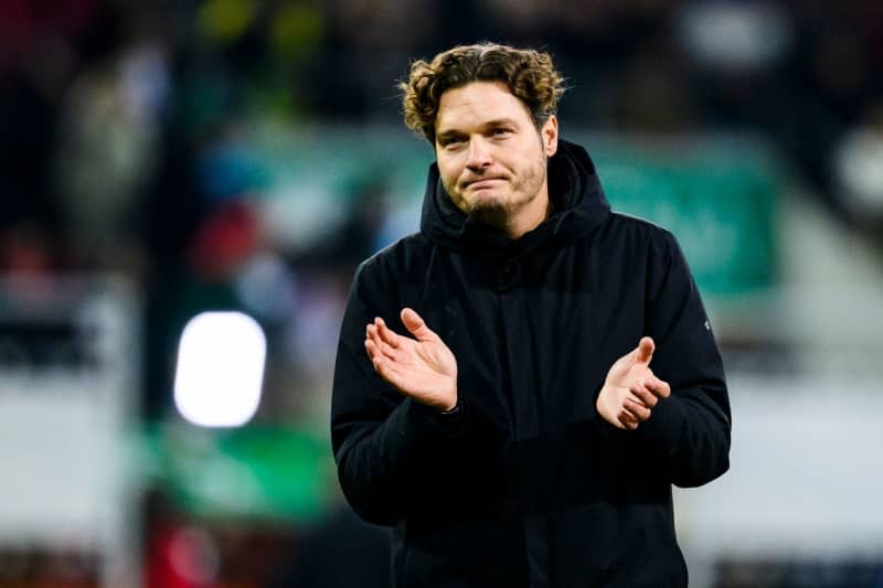 Dortmund coach Edin Terzic reacts dissatisfied after the German Bundesliga soccer match between FC Augsburg and Borussia Dortmund at WWK-Arena. Coach Edin Terzic is not responsible for Borussia Dortmund's poor showings in the Bundesliga, their former helmsman Ottmar Hitzfeld has said. Tom Weller/dpa