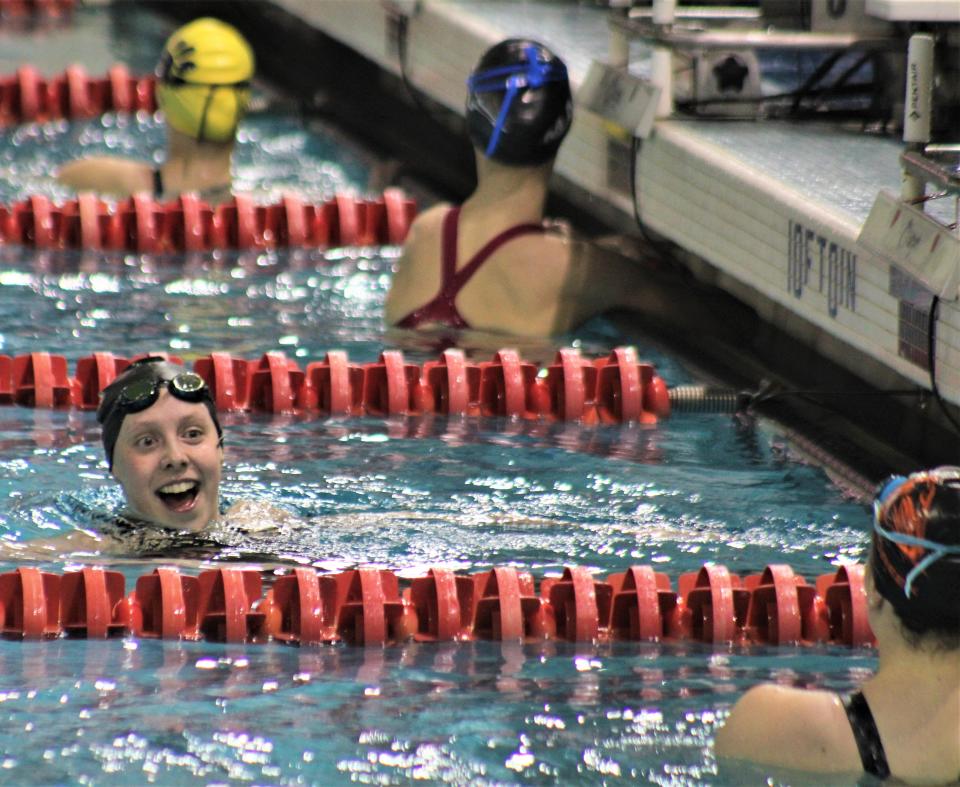 Turpin senior Ava Sutphin reacts to her district championship in the 500 freestyle uring the OHSAA Southwest District Division I girls swimming championships Feb. 18, 2023 at Miami University