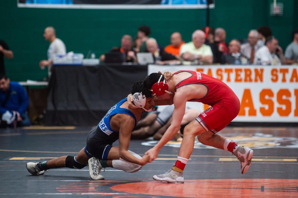 Wallkill's Banda Viktor, left, wrestles Somers-North Salem's Cal Ehrmann in the 124 pound weight class during Eastern States Classic wrestling at SUNY Sullivan in Loch Sheldrake, NY on Friday, January 12, 2024. KELLY MARSH/FOR THE JOURNAL NEWS