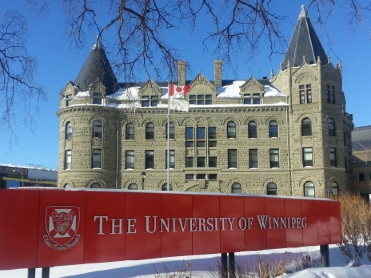 Posters for a lecture by U of W political science Prof. Joanne Boucher show her talk planned this Friday is titled 'The Commodification of the Human Body: The Case of Transgender Identities.' Boucher declined to be interviewed by CBC News. (Donna Lee/CBC - image credit)