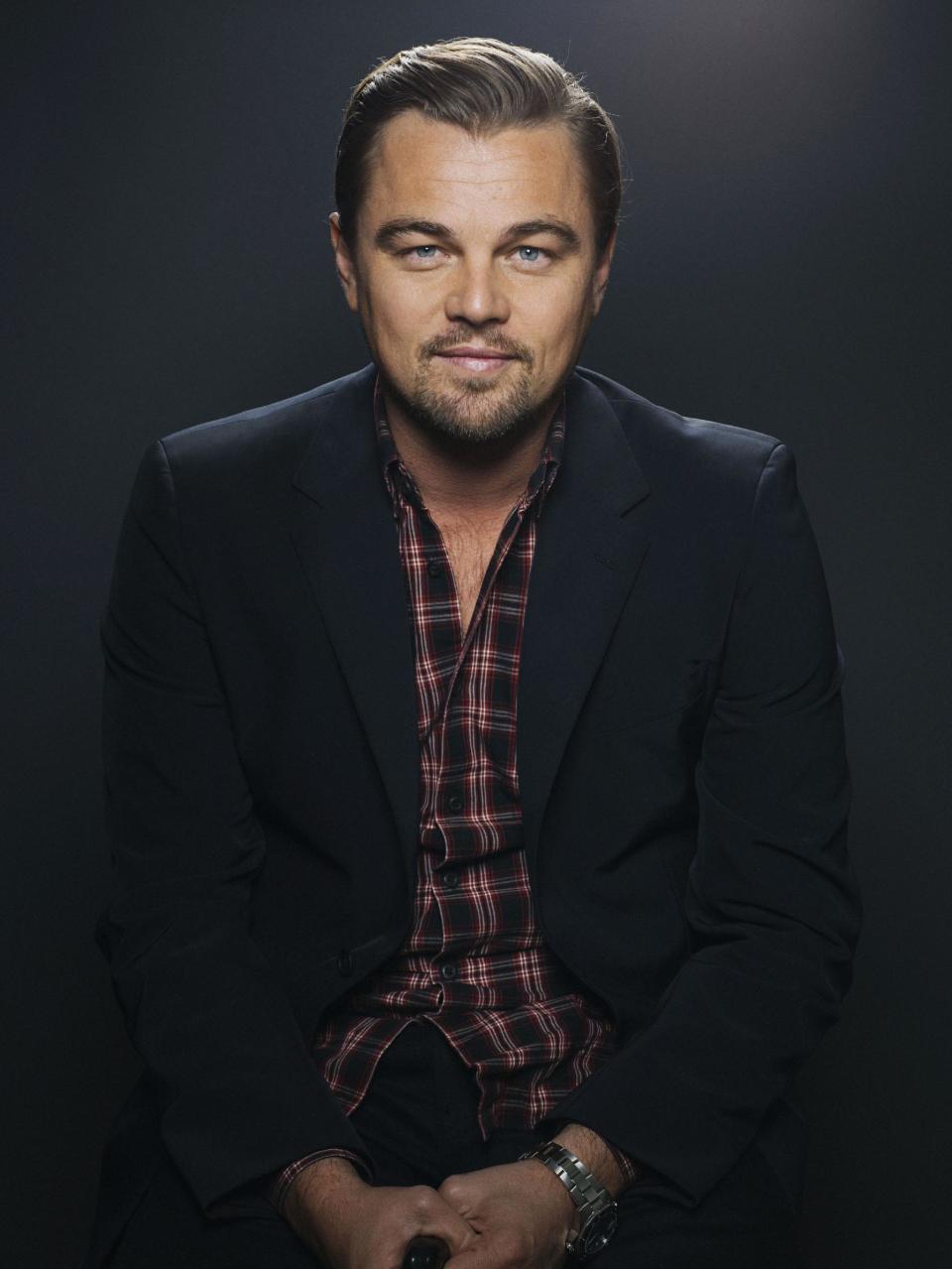 In this Dec. 15, 2013 photo, American actor Leonardo DiCaprio poses for a portrait, in New York. DiCaprio has been nominated for three other Academy Awards, starting with a supporting actor bid for playing a teen with autism in the 1993 drama “What’s Eating Gilbert Grape.” This year, with his Oscar nomination for "The Wolf of Wall Street," he’s up against lead actors Christian Bale, Chiwetel Ejiofor, Bruce Dern and Matthew McConaughey, who is considered DiCaprio’s biggest threat for his portrayal of a rodeo-loving Texan with HIV in “Dallas Buyers Club.” (Photo by Victoria Will/Invision/AP)