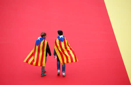 People attend a concert organised by the pro-independence Catalan National Assembly (ANC) to demand leaders currently jailed, at the Olympic stadium in Barcelona, Spain, December 2, 2017. REUTERS/Javier Barbancho