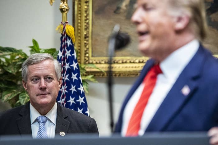 Former White House Chief of Staff Mark Meadows listens as President Donald Trump speaks during a signing ceremony for Executive Orders on transparency in Federal guidance and enforcement.