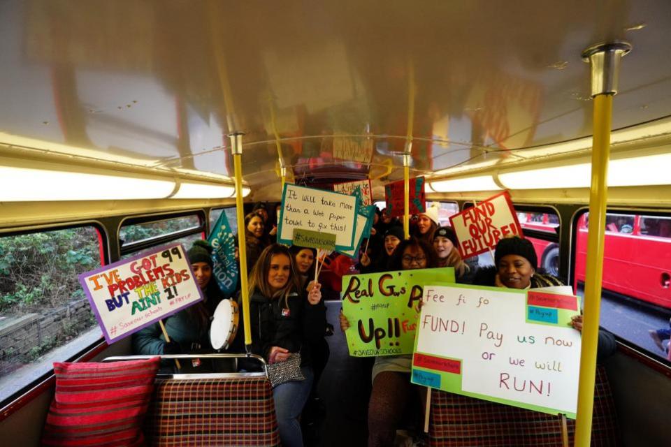 News Shopper: Strikers board Routemaster buses to travel into central London for the Protect The Right To Strike march and rally