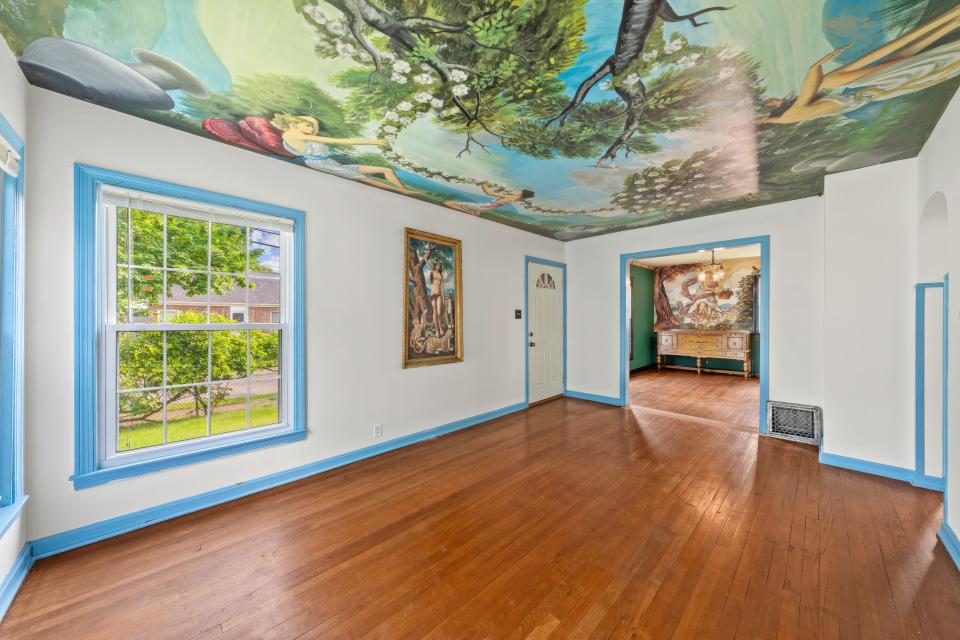 A home for sale in Akron's Kenmore neighborhood features artwork by late artist Ralph Herzog.