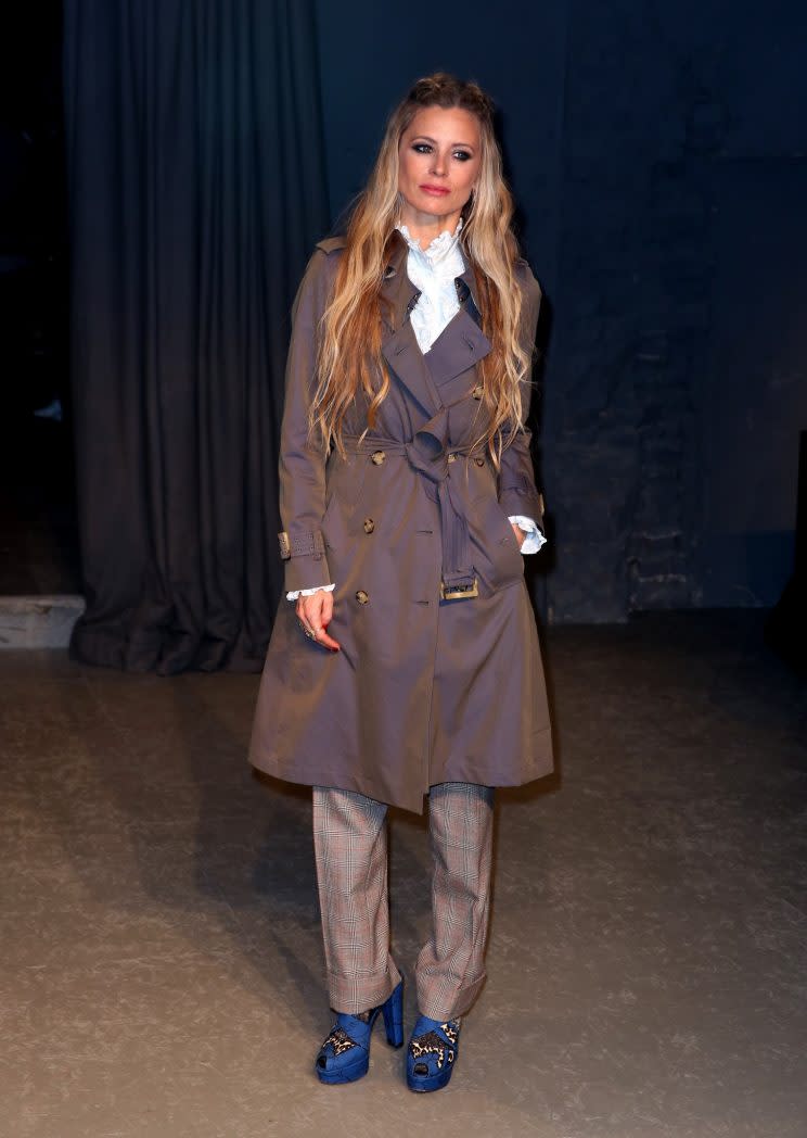 Model Laura Bailey donned a trench coat for the occasion. [Photo: PA]